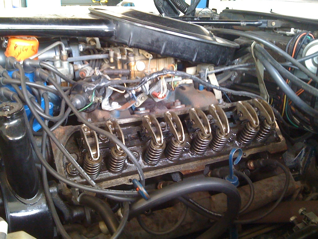 new valve gaskets had to be installed and the valve covers repainted. Note how clean the engine looks inside!