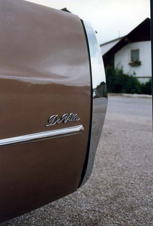 the bent rear bumper outer end and the too short belt trim