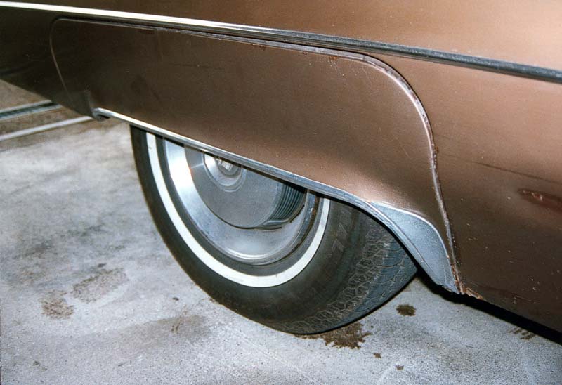 rusted fender skirts and some more dents