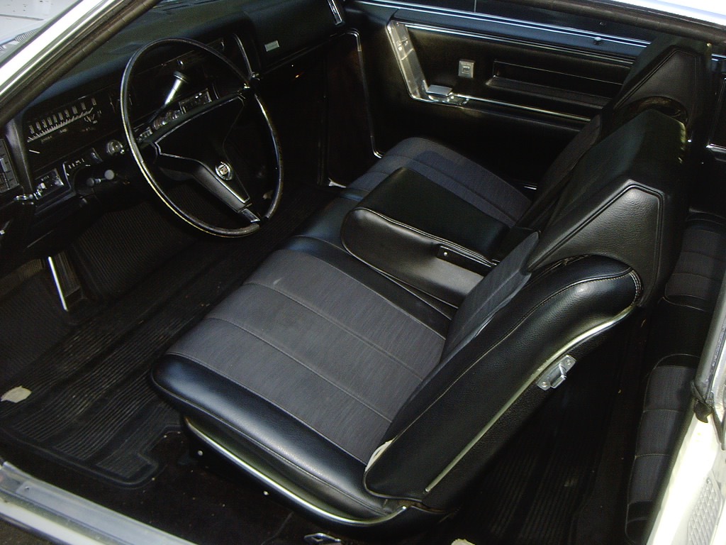 Strato Bench Seat is shown in Black Darien Cloth and Vinyl with optional headrests
