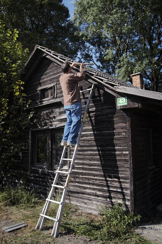 I made some repairs on the wooden building next to the garage