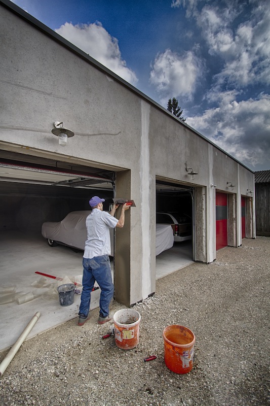 May 18th 2013 - My friend Richard Vobr once again helped me out! Here he is doing some plastering work around the garage doors