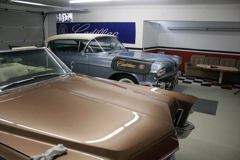 Cadillacs in garage