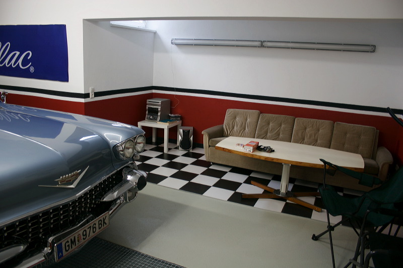 Cadillacs in garage