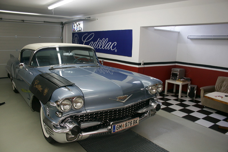 Cadillacs in garage