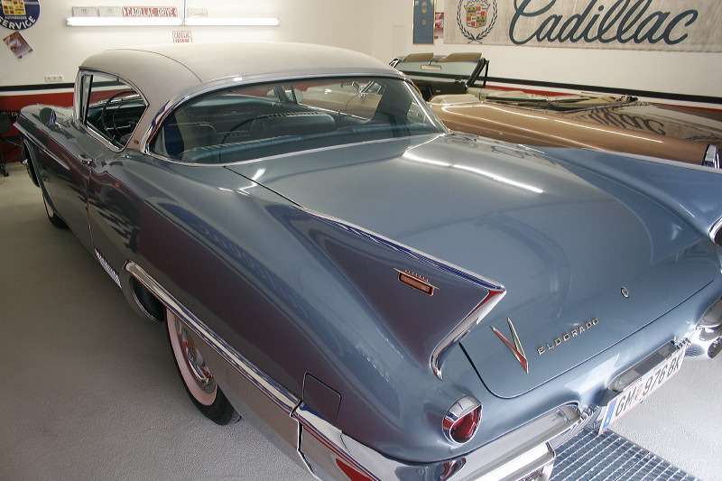 Cadillacs in garage