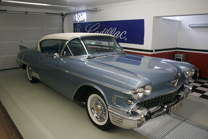 Cadillacs in garage