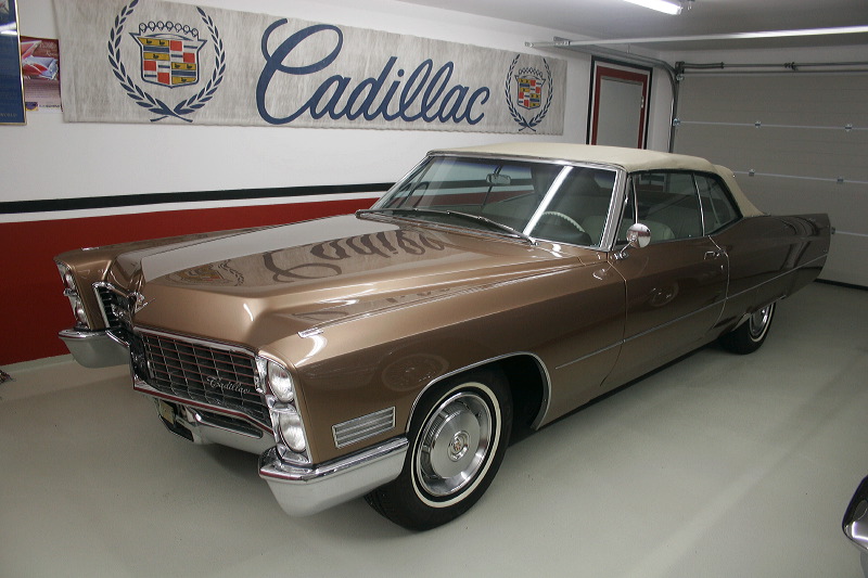 Cadillacs in garage