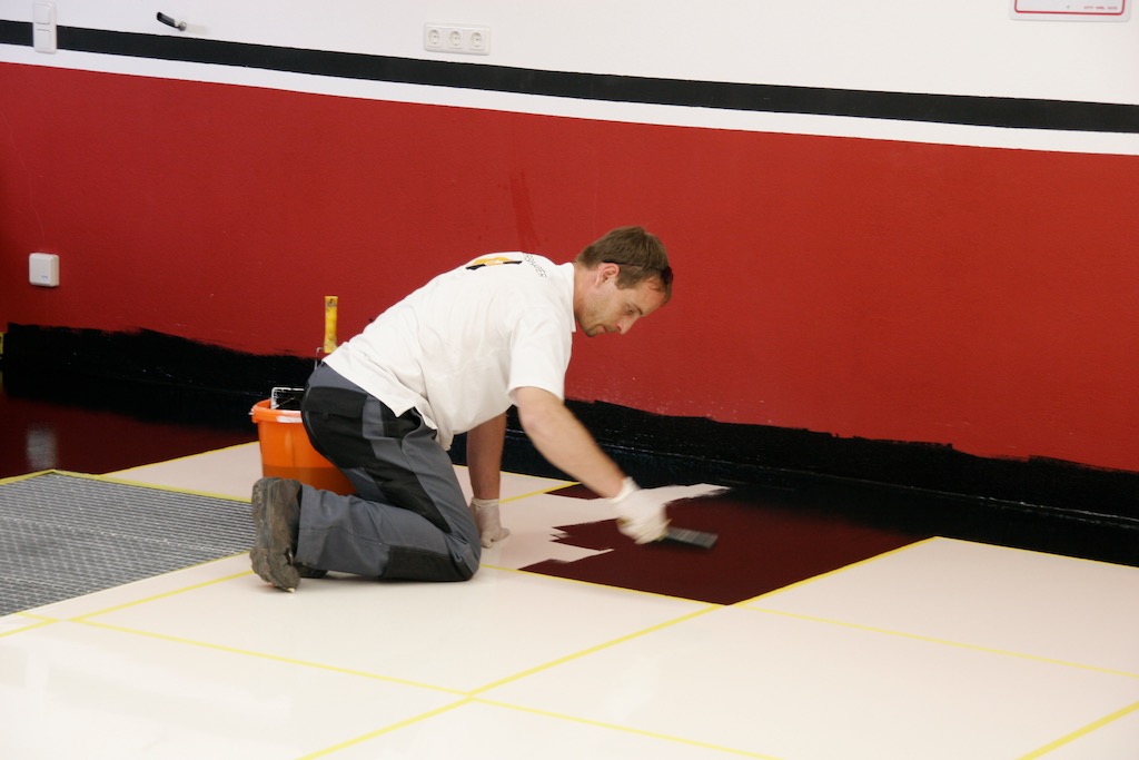 the first coat of black epoxy paint applied