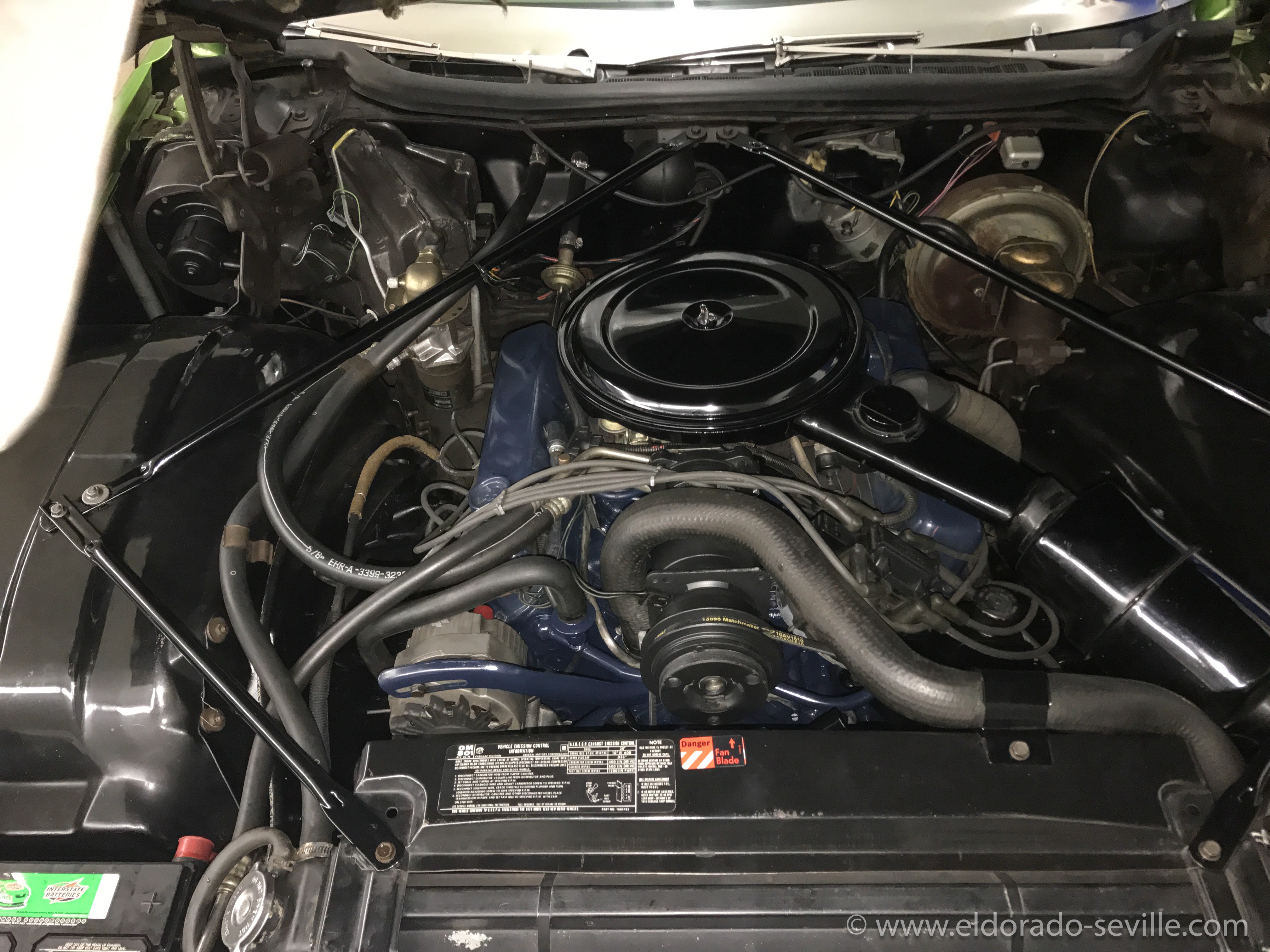 The engine bay after cleaning it up